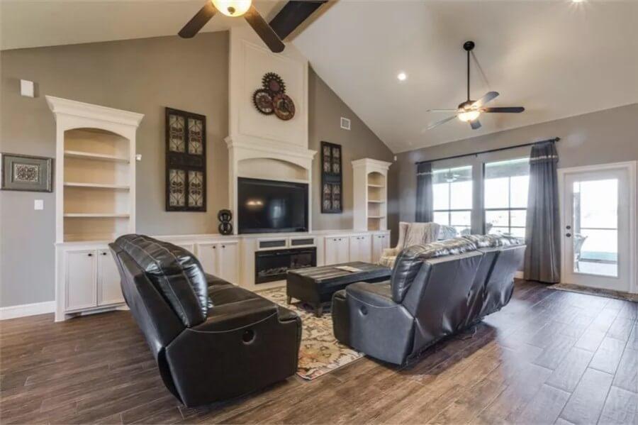 Expansive Living Room with Oversized Vaulted Ceiling and Built-Ins