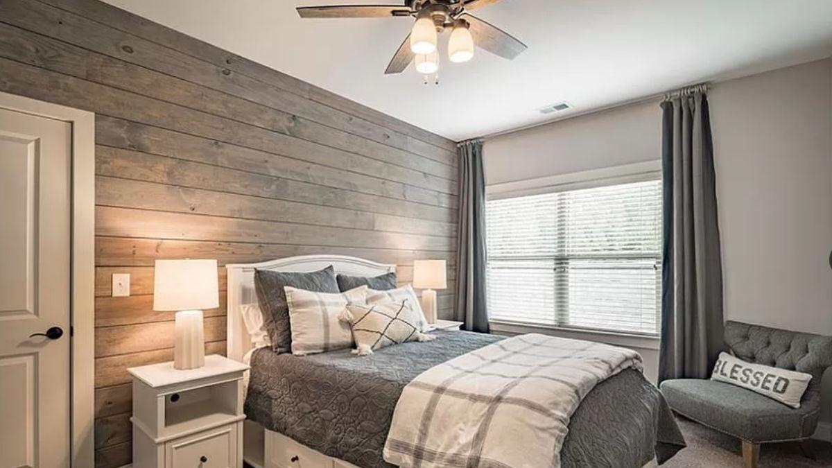 Notice the Textured Accent Wall in This Tranquil Bedroom