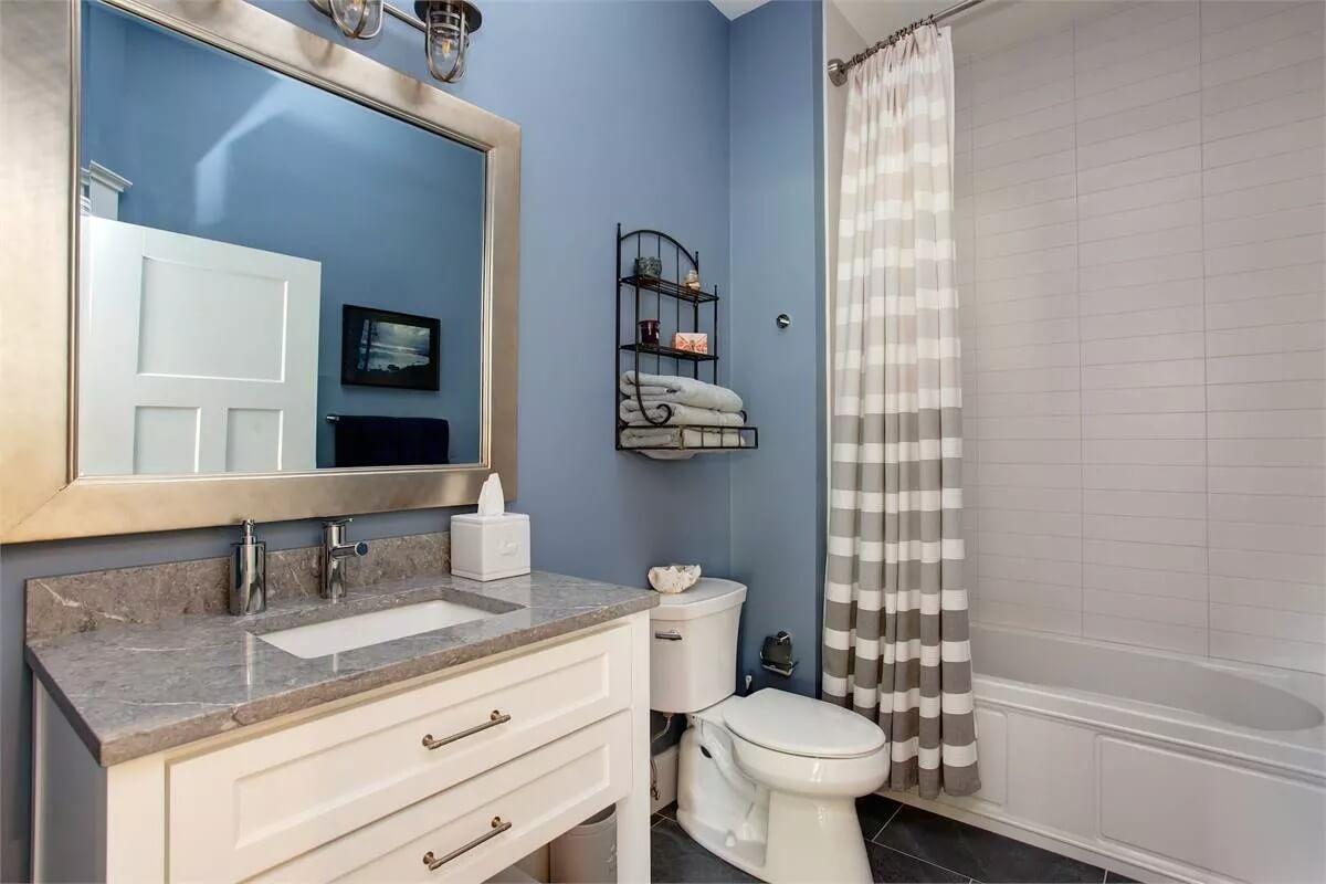 Subtle Elegance in This Blue-Hued Craftsman Bathroom