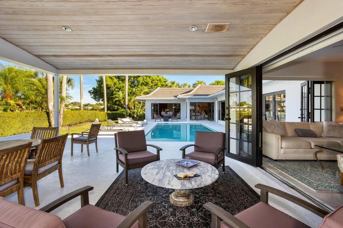 Seamless Indoor-Outdoor Lounge with Views of the Pool