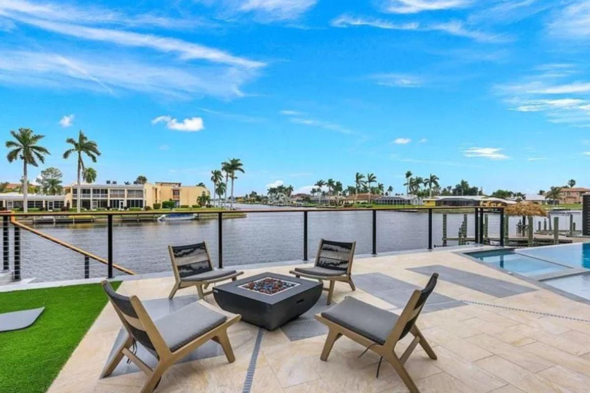 Check Out This Canal-Side Terrace with a Cozy Fire Pit