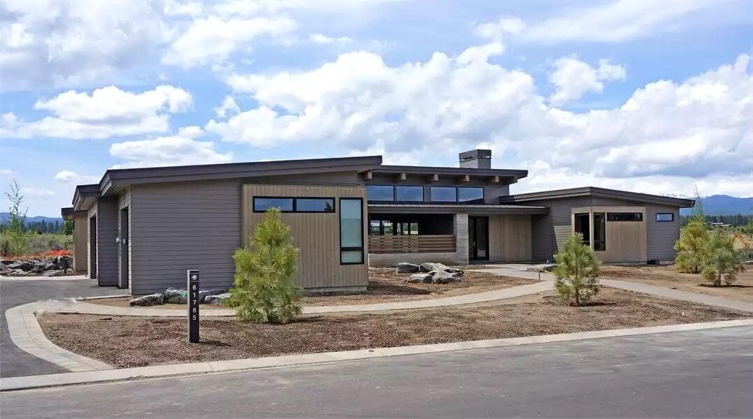 Explore This Sleek Mid-Century Modern Home with Striking Rooflines