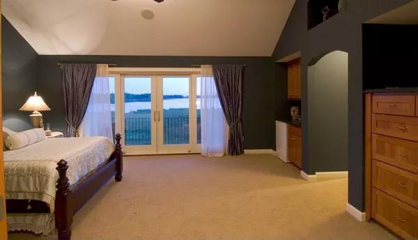 Gorgeous Bedroom with Breathtaking Lake View Through French Doors