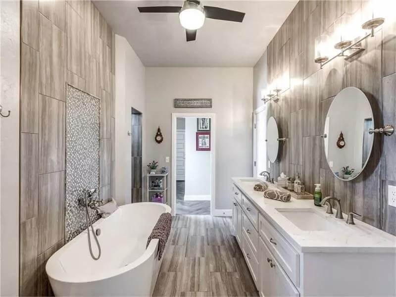 Freestanding Tub Meets Dual Vanity in This Serene Bathroom