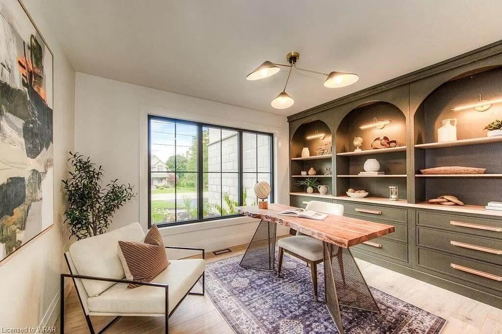 Elegant Home Office with Illuminated Built-in Shelving