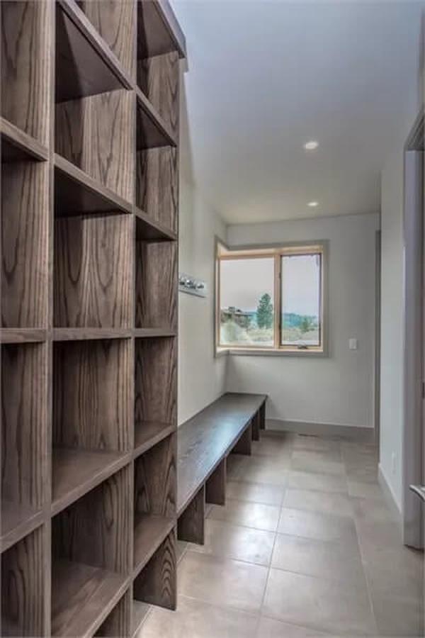 Efficient Mudroom with Built-In Cubbies and Bench Seating