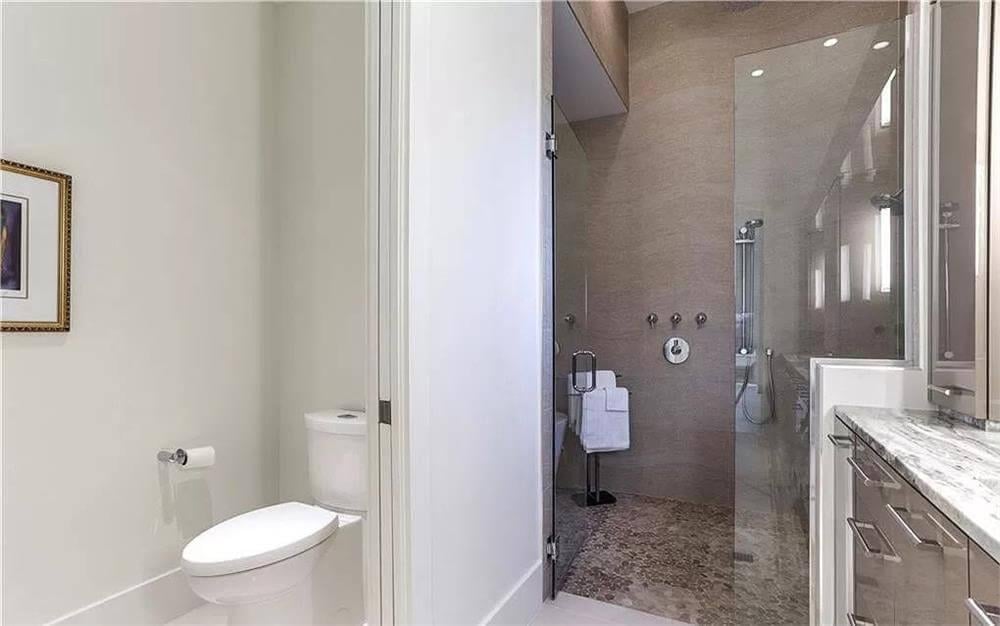 Wow, Check Out the Sleek Glass Enclosure in This Bathroom