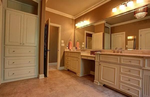 Dual Vanity Bathroom with Classic Cabinetry and Warm Tones
