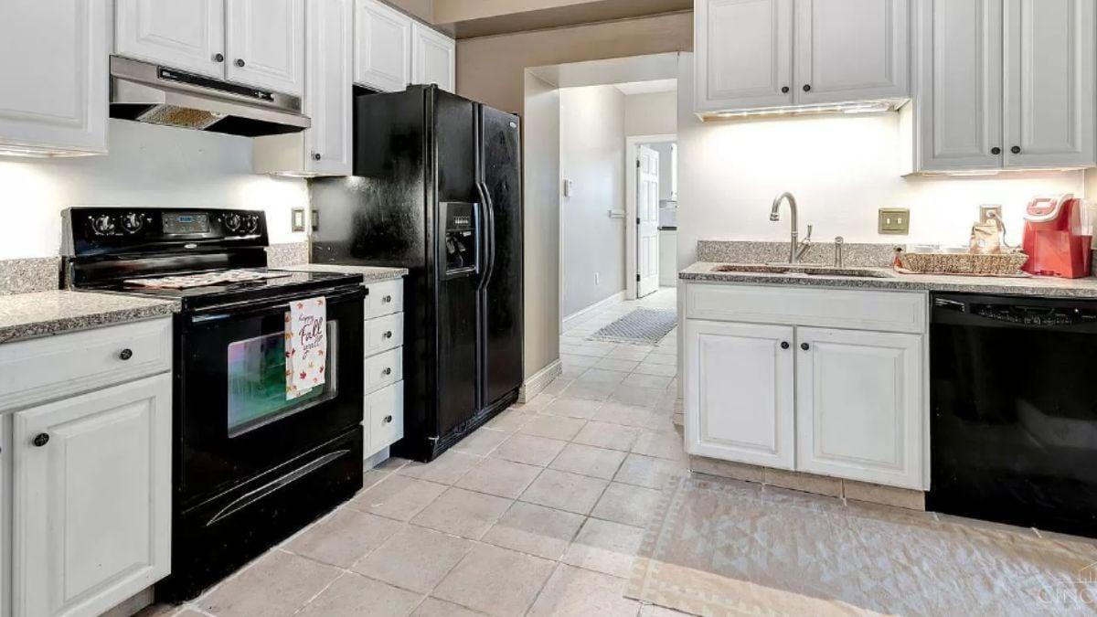 Bright Kitchen with Classic White Cabinets and Granite Countertops