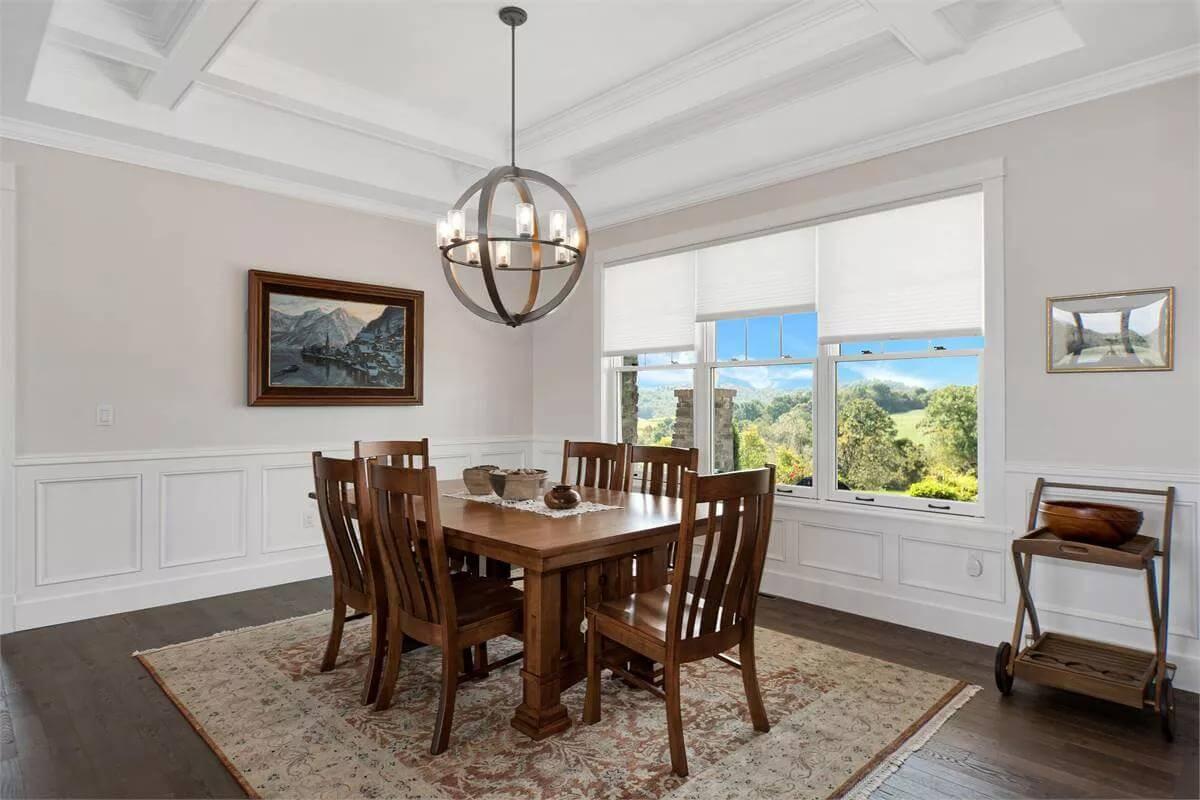 The Orb Chandelier Really Adds a Touch of Drama to This Classic Dining Room