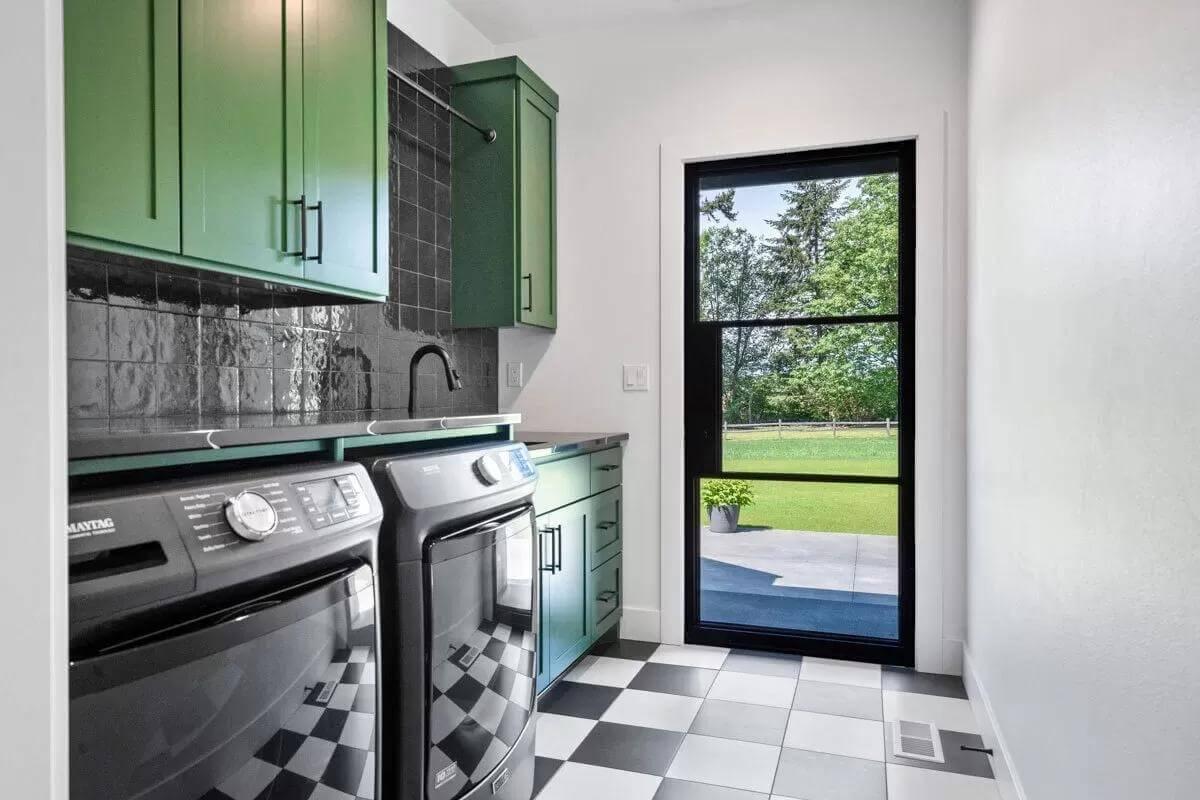 Vibrant Laundry Room with Fun Checkered Floors and Garden View