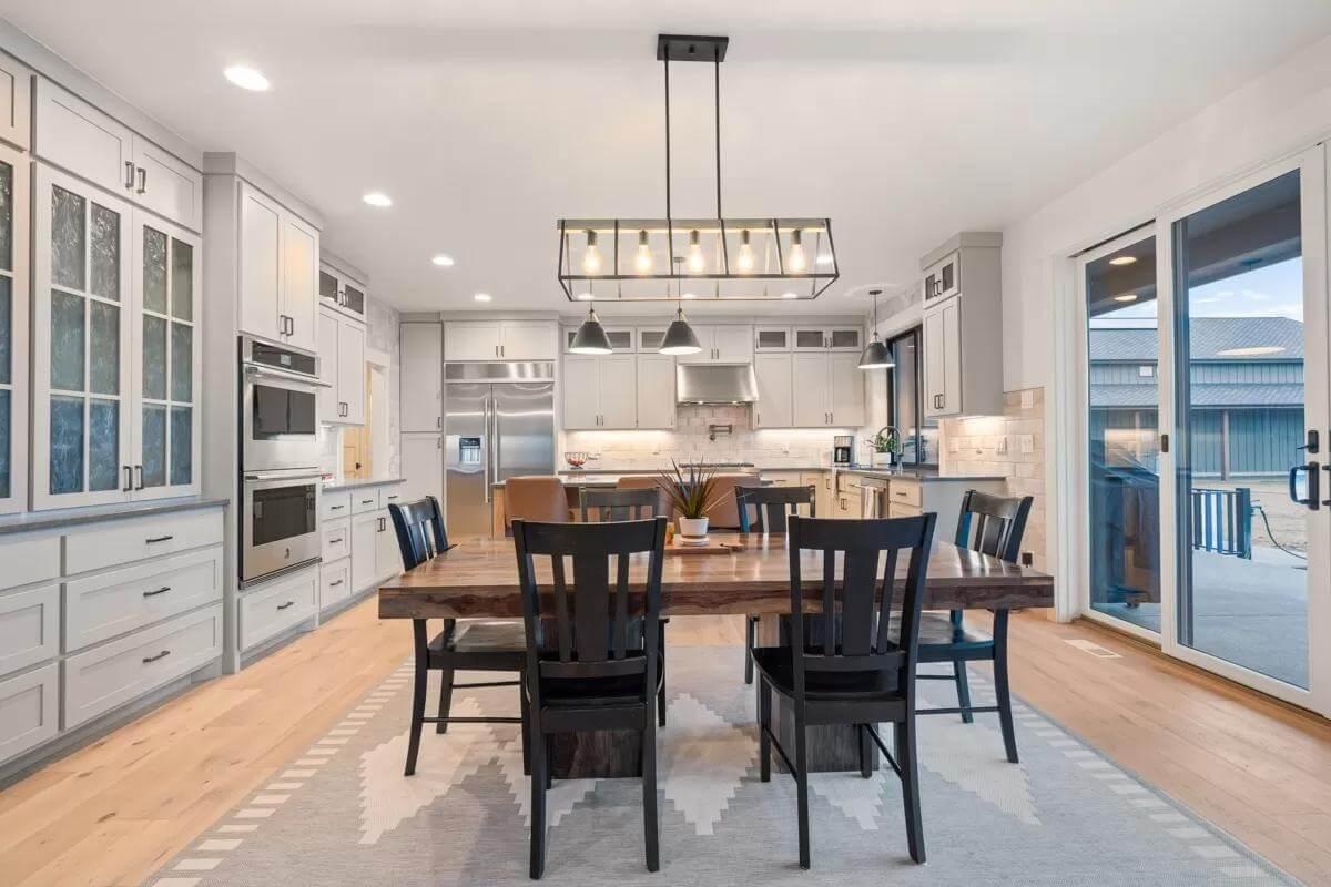 Dining Area with Rustic Table and Modern Lighting