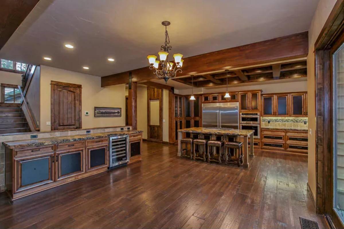 Notice the Expansive Island and Rich Wood Tones in This Craftsman Kitchen