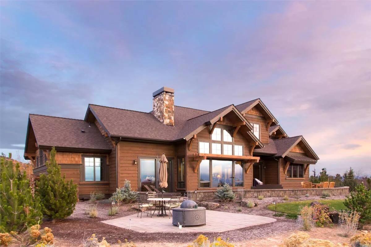 Experience the Vaulted Gables and Stone Chimney in This Craftsman Exterior