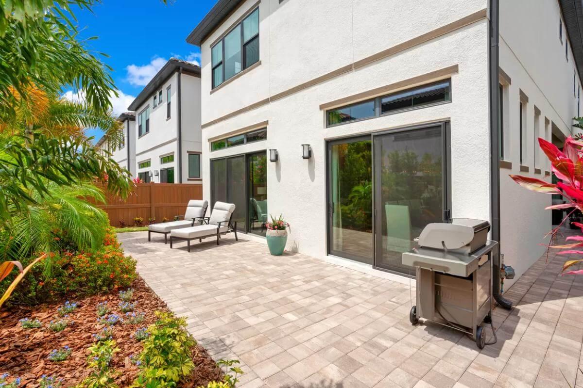 Look at This Sleek Patio with Sliding Glass Doors for Easy Indoor-Outdoor Living