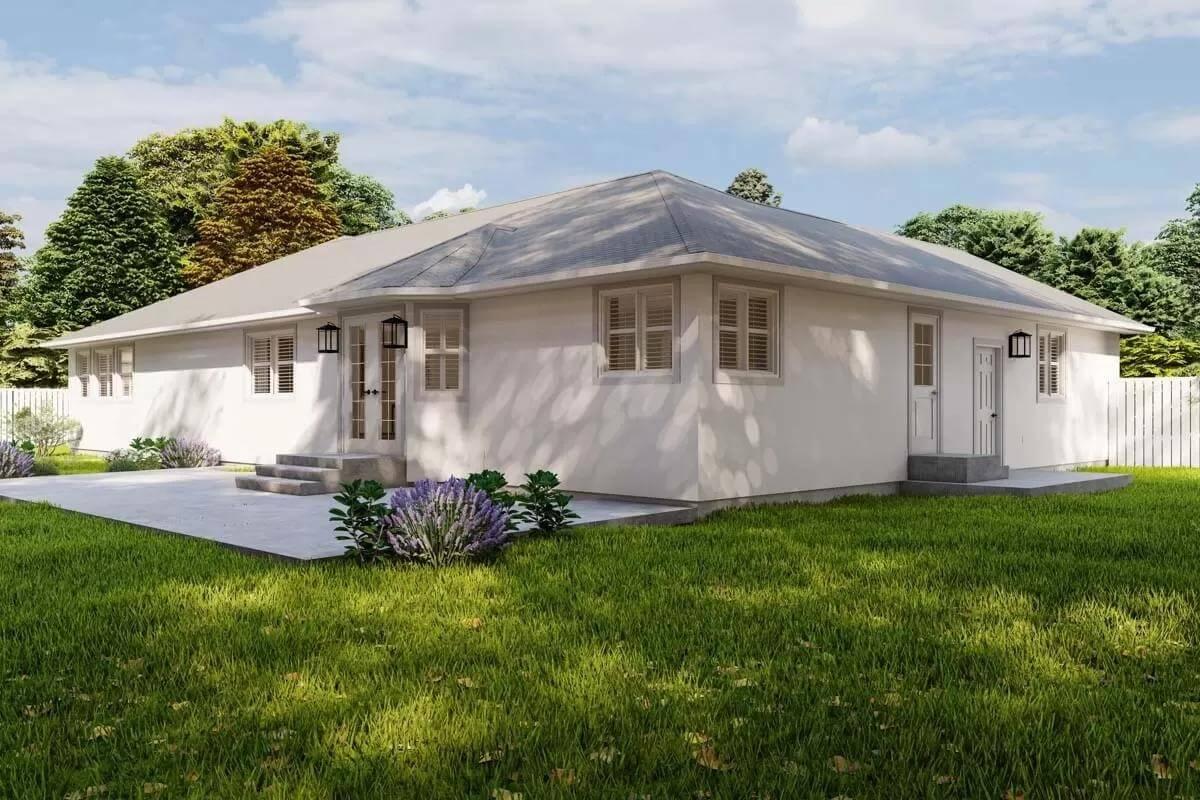 Simple Beauty: Crisp White Facade with Thoughtful Landscaping