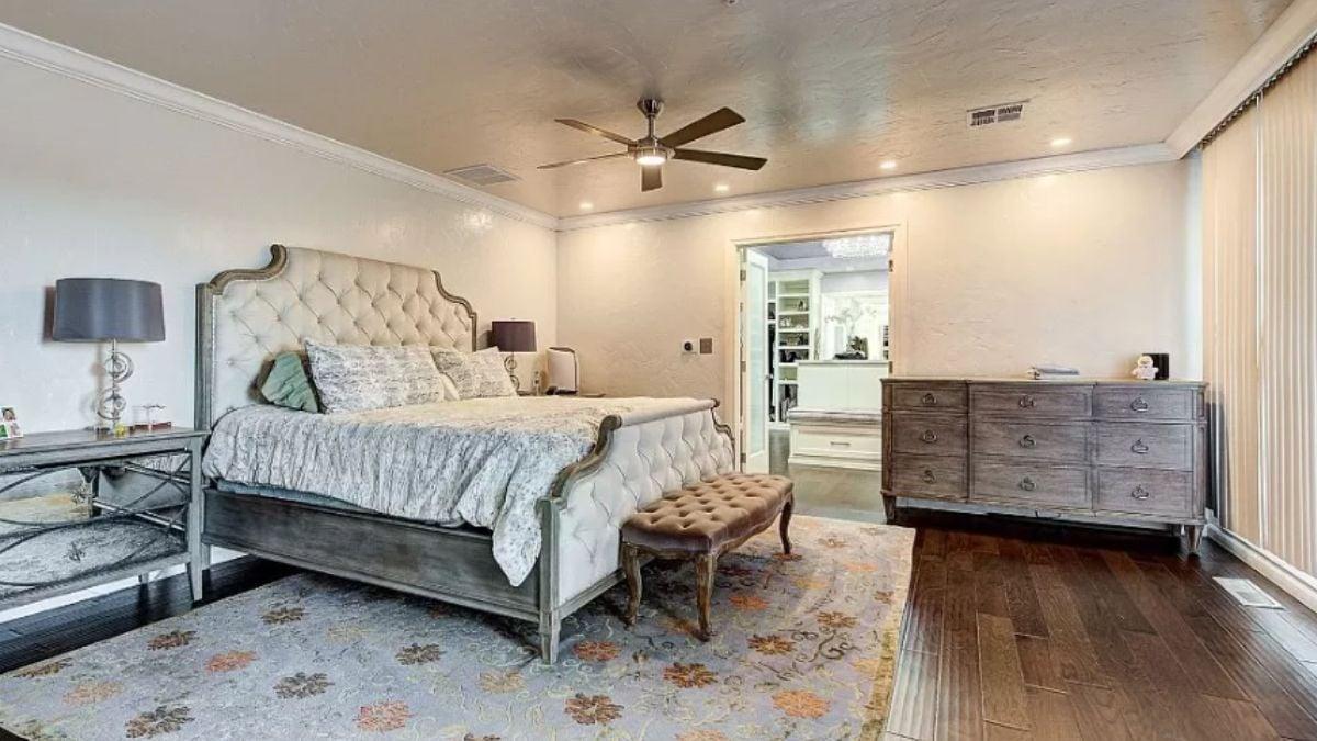 Take a Look at the Luxurious Upholstered Bed in This Peaceful Master Suite
