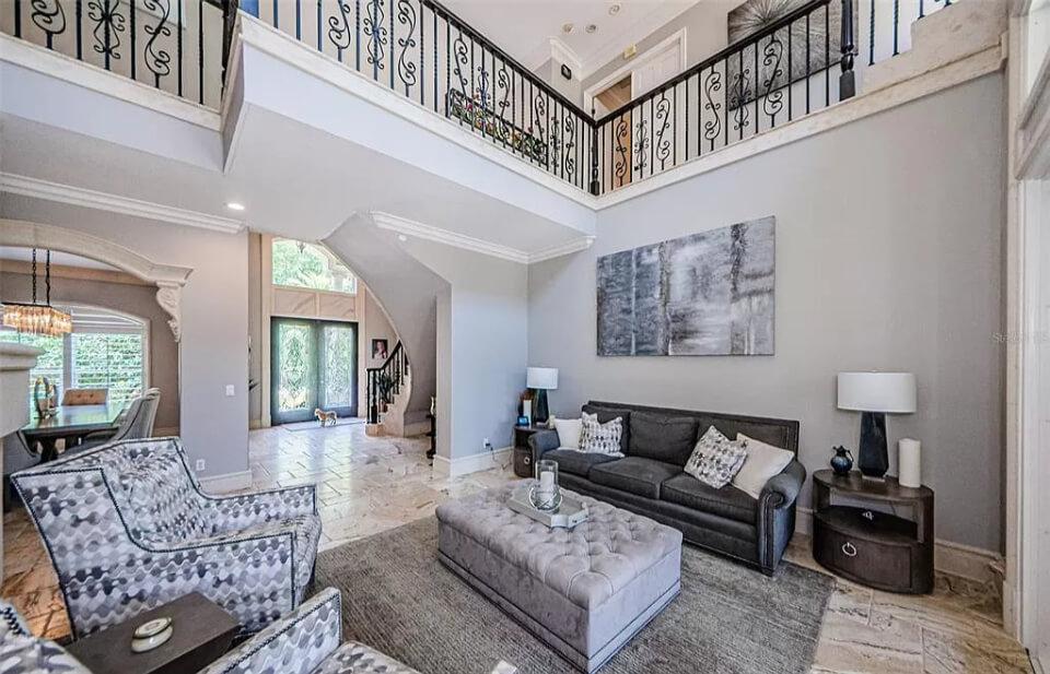 Stunning Living Room with Ornate Iron Balustrades