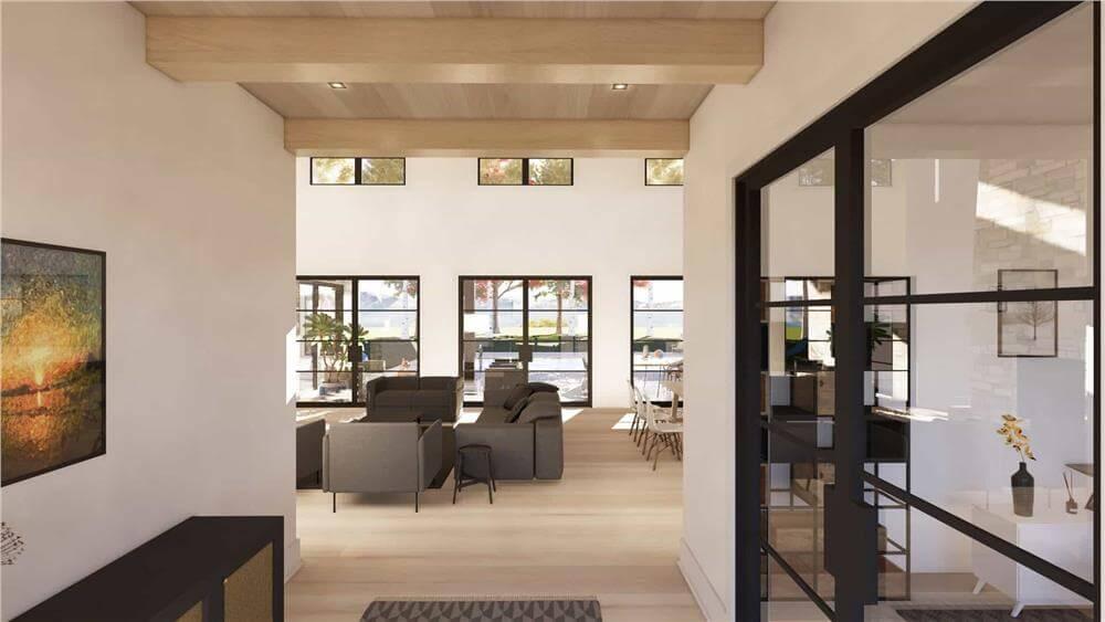 Vast Living Space with Floor-to-Ceiling Windows for Bright Ambiance