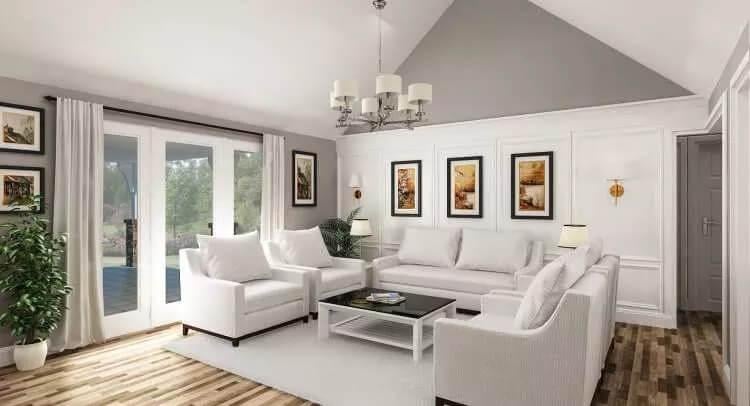 Elegant Living Room with Vaulted Ceiling and Artful Touches