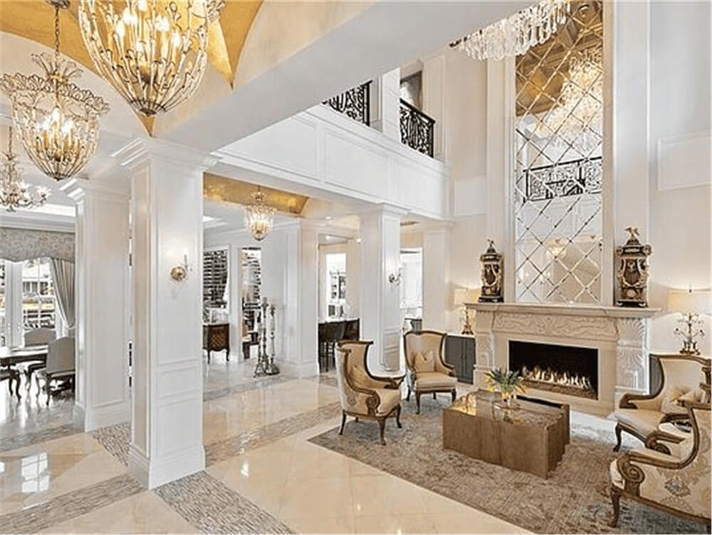 Luxe Living Room with Dazzling Chandeliers and Ornate Inlays