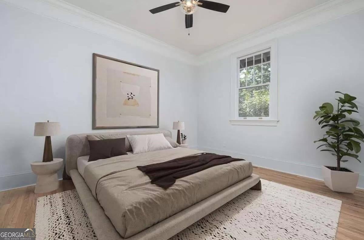 Minimalist Bedroom Design with a Striking Black Ceiling Fan