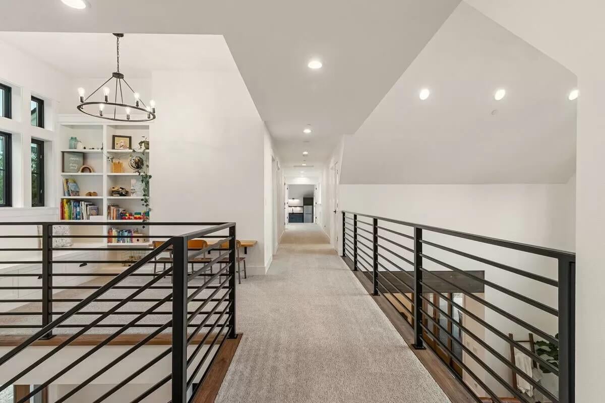 Spot the Built-In Reading Nook Along This Upper Loft Hallway