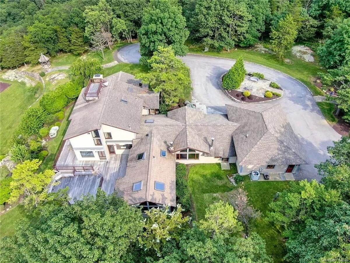 Notice the Unique Rooflines and Expansive Decks in This Modern Retreat