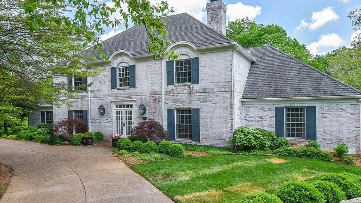 Classic Colonial Façade with Distinct Arched Windows