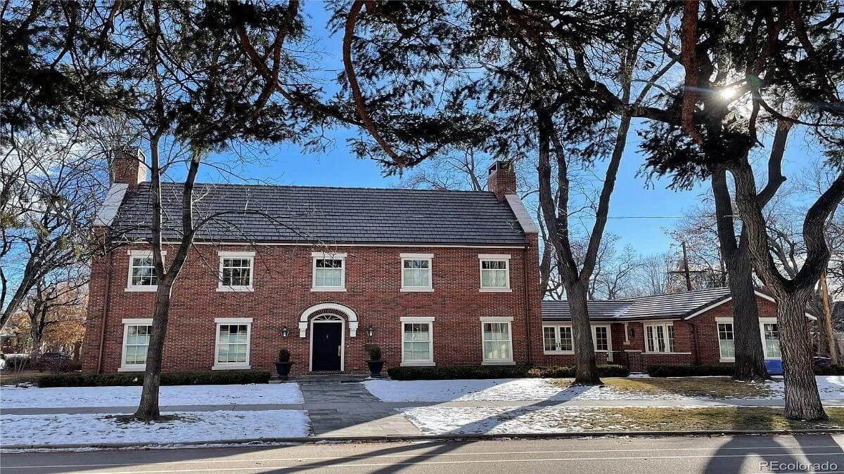 Classic Brick Facade With Symmetrical Design and Detailed Entryway