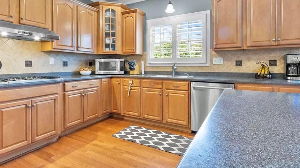 Check Out the Under-Cabinet Lighting That Highlights These Wooden Cabinets