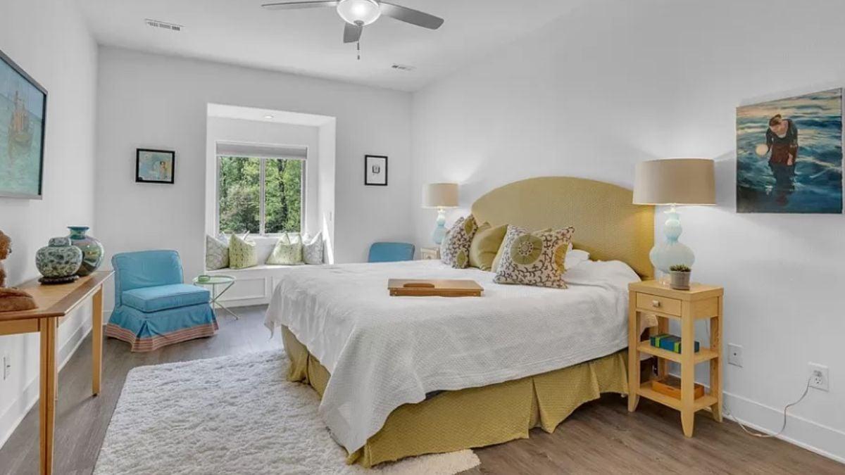 Charming Bedroom with a Cozy Window Seat for Relaxation