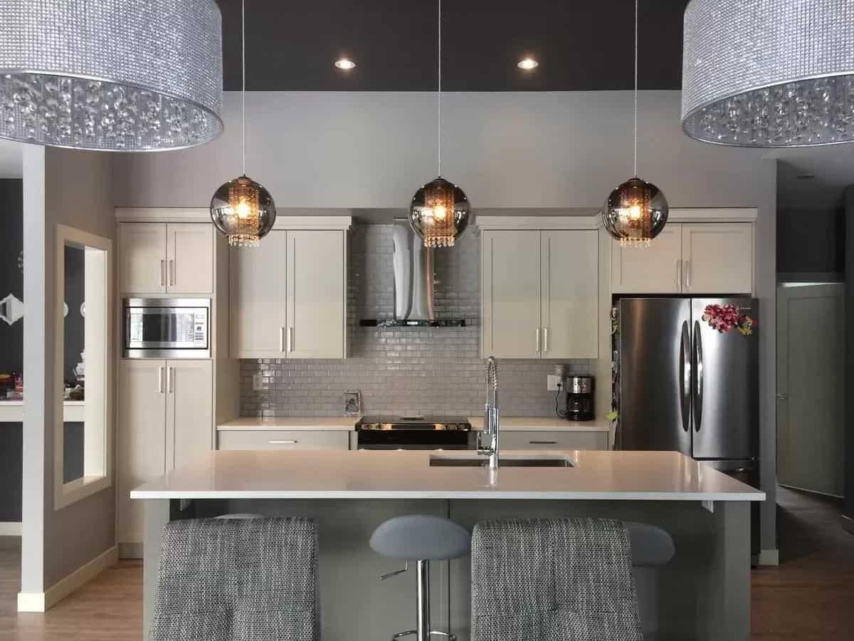 Modern Kitchen Featuring Eye-Catching Pendant Lighting