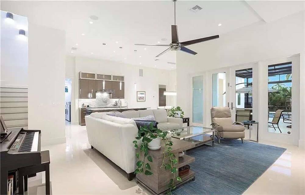 Light and Airy Living Room with an Expansive Blue Rug