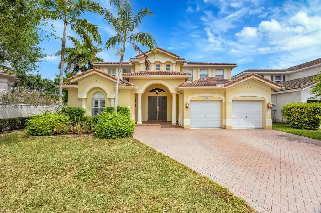 Mediterranean 4-Bedroom Revival-Style Home with Covered Patio and Two-Car Garage (2,747 Sq. Ft. Floor Plan)