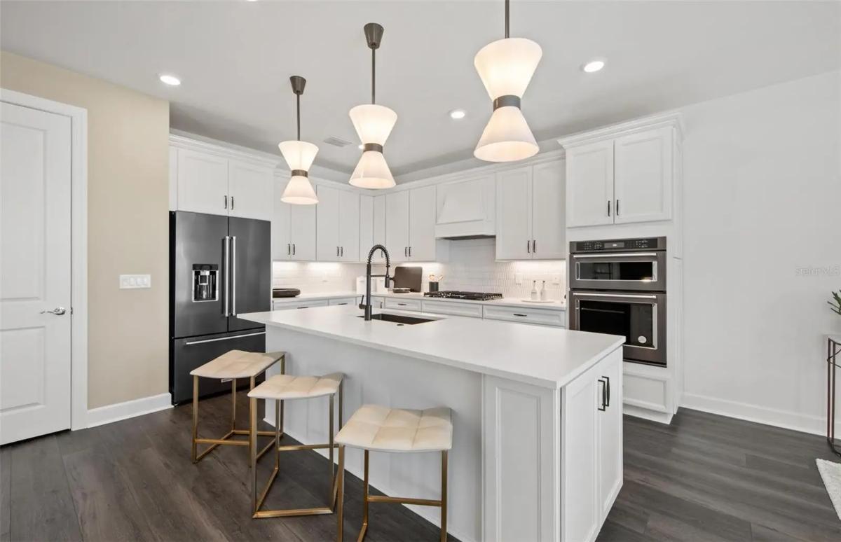 Contemporary 5-Bedroom Coastal Home with Open-Concept Living and 3-Car Garage (3,415 Sq. Ft. Floor Plan)