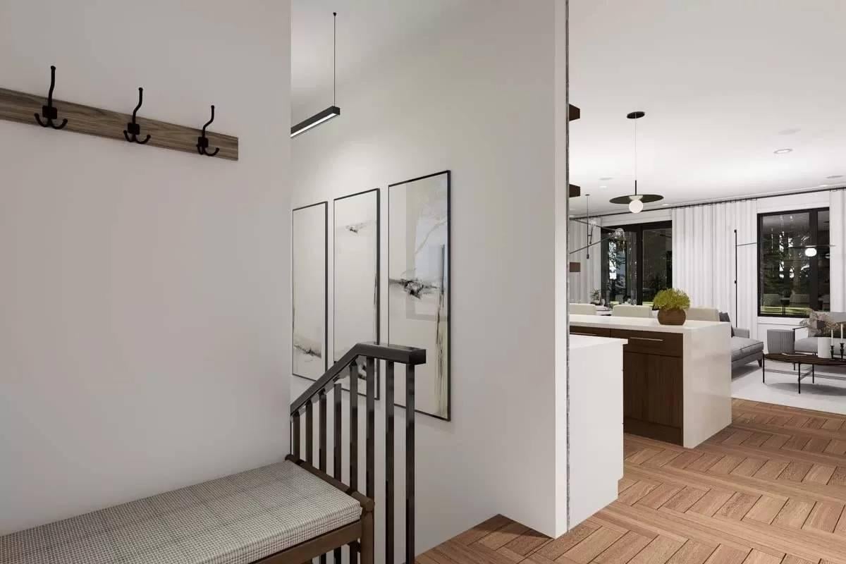 Entryway with Simple Wall Art and Functional Hooks