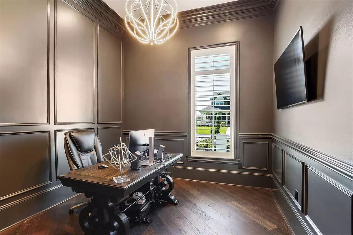 Look at This Sleek Home Office With Its Elegant Wainscoted Walls