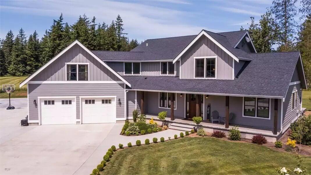 Craftsman Charm with a Spacious Covered Porch and Dormer Windows
