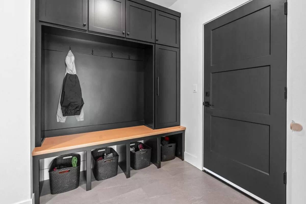 Functional Mudroom with Stylish Black Cabinetry