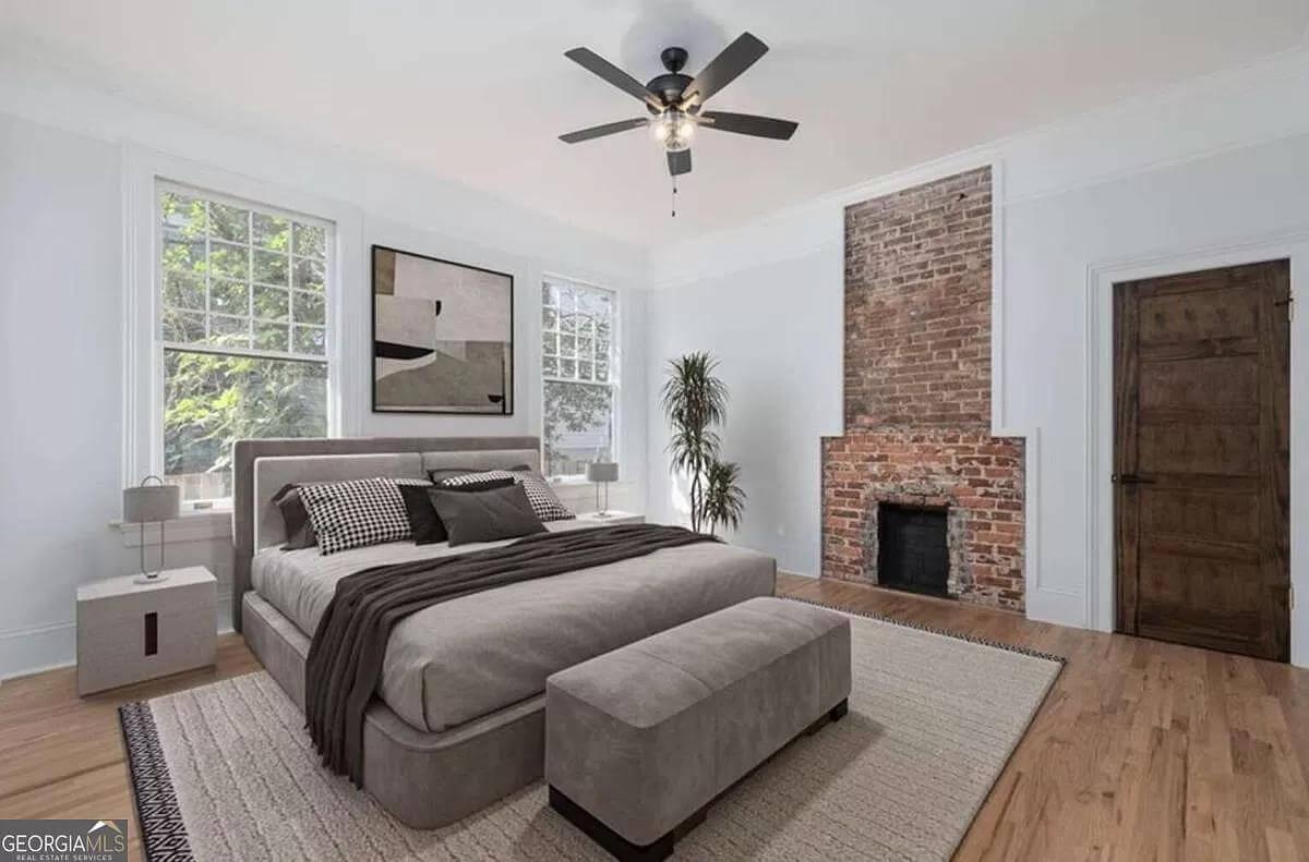 Explore the Subtle Charm of the Brick Fireplace in This Cozy Bedroom