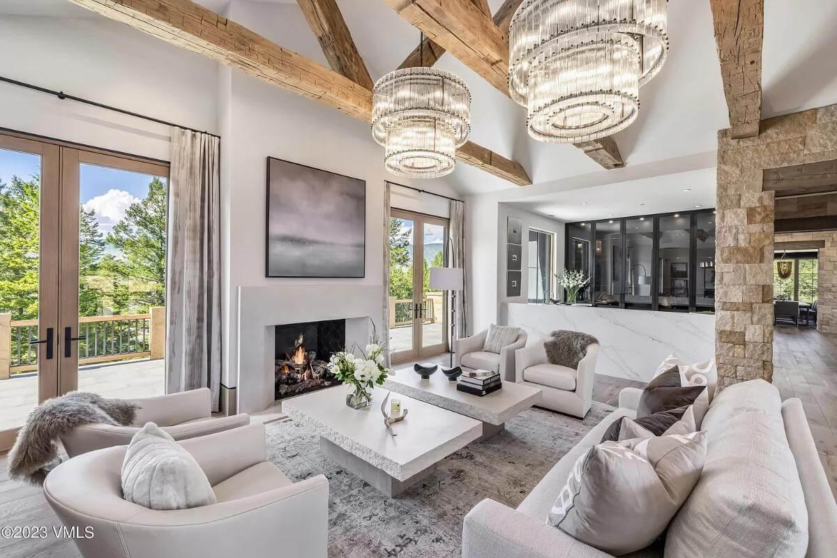 Those Dramatic Chandeliers Steal the Show in This Gorgeously Textured Living Room