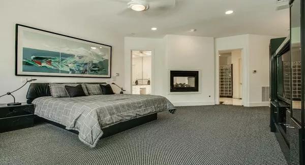 Check Out That Double-Sided Fireplace Enhancing This Master Suite