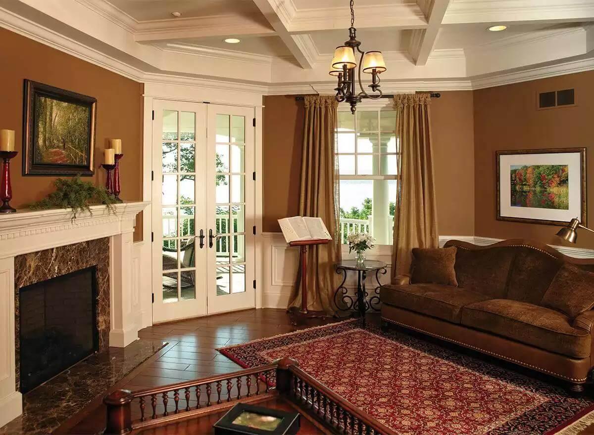 Take in the Coffered Ceiling and Elegant Mantel in This Refined Living Room