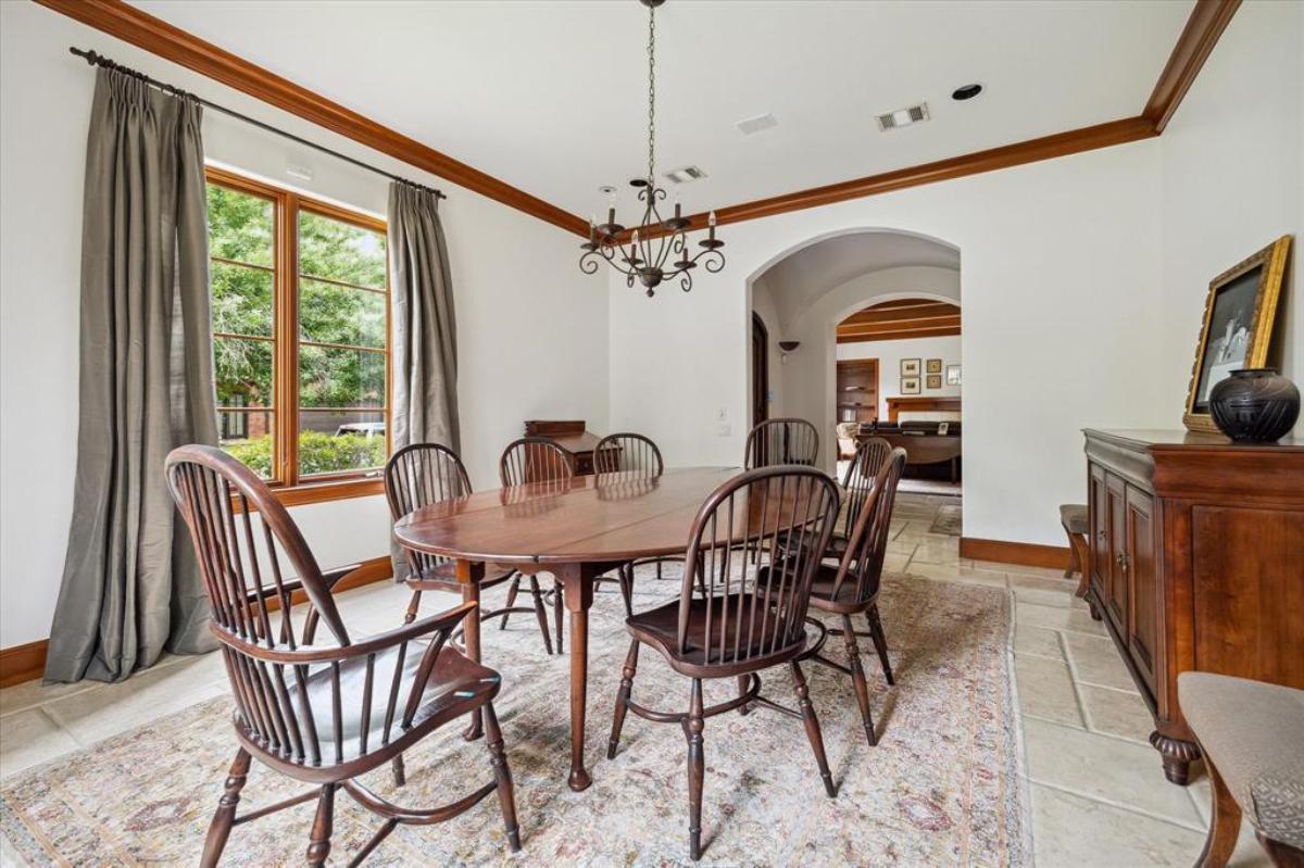 Notice the Rich Wood Tones in This Sophisticated Dining Room