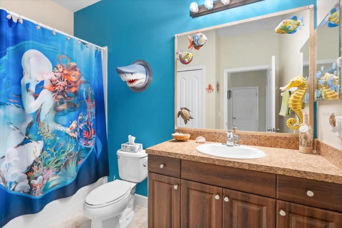 Contemporary 3-Bedroom Florida Home with Front Porch and Screened-in Pool (1,805 Sq. Ft. Floor Plan)