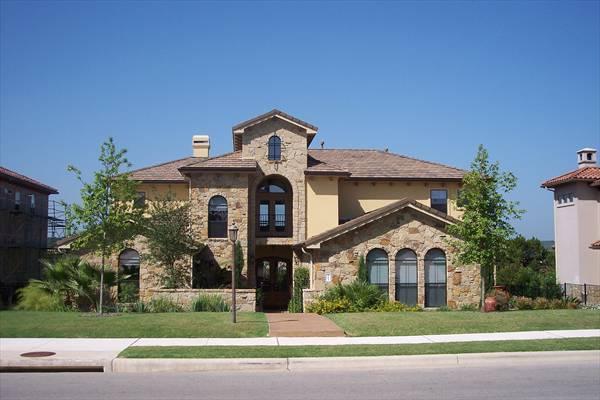 Mediterranean Elegance with Stunning Stone Facade
