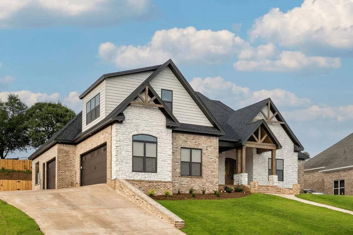 Notice the Blend of Stone and Brick in This Charming Craftsman Home
