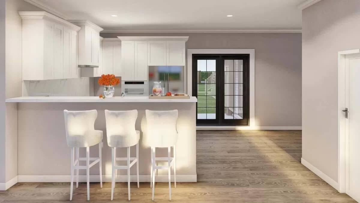 The Chic White Kitchen with an Inviting Breakfast Bar