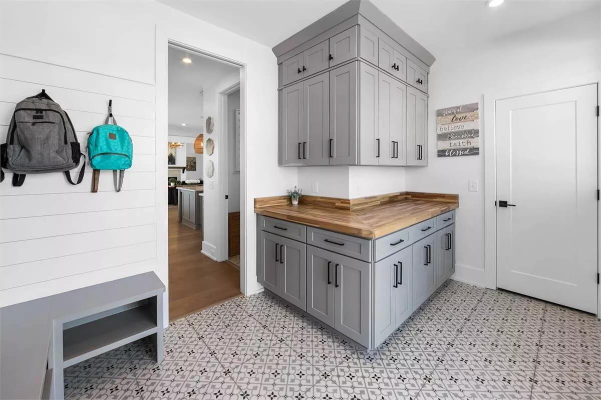 Notice the Unique Tile Flooring in This Functional Mudroom